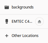 From the File Manager (Thunar) click the Eject symbol