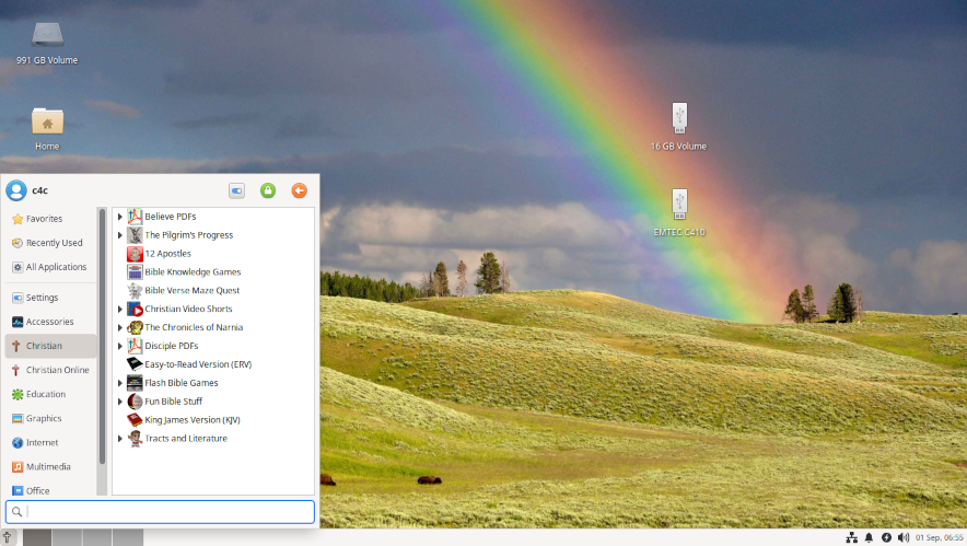 Live desktop with open Christian menu and 2 mounted USB keys
